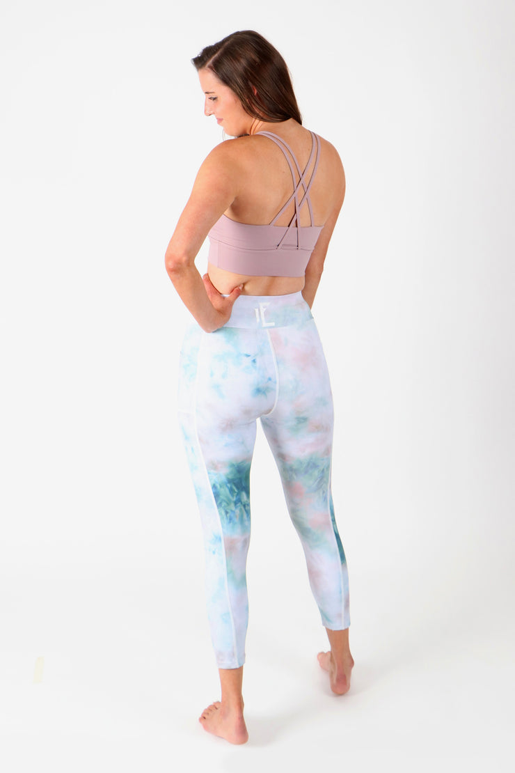 1Enemy tie-dye sports leggings with pockets, and  in  a fun tie dye pattern to pump up your workout.    