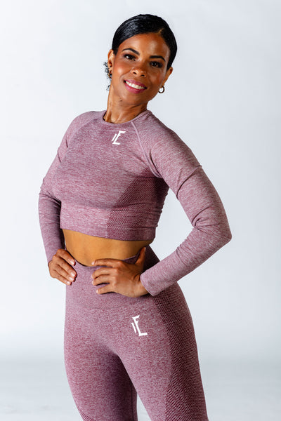 1Enemy's long sleeve crop top has thumbholes to prevent sleeves from sliding up, and provides comfort and support for your workout. #color_burgundy