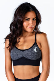 1Enemy's seamless black and grey sports bra contours to your body to provide a flattering and supportive look to your fitness wardrobe.  #color_black-grey-wave