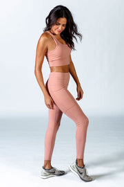 1Enemy's cargo gym leggings with pockets offer a variety of colors in the soft, sleek material that enhances your shape and workout.#color_dusty-rose