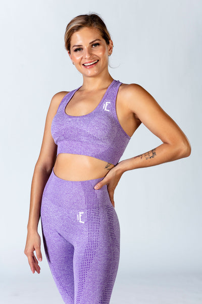 1Enemy's purple racerback sports bra is is soft and seamless, but provides optimal support for your high impact workout. #color_purple