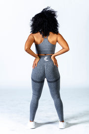 This grey sports bra with thin adjustable straps is perfect for any high impact workouts, and comfortable enough for you days off.#color_grey