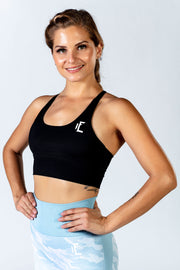 1Enemy's black cargo crossback seamless sports bra made from buttery soft material, with strappy accents to add extra support during your workout. #color_black