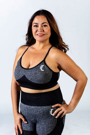1Enemy's black and grey workout sports bra is adjustable to provide optimal support for your workout.  #color_black-grey-wave