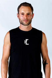 The 1Enemy gym tank tops for men are engineered to keep up with even your toughest workout. The soft material, sleeveless design and regular fit combine to help you train with more range of motion and freedom. #color_black
