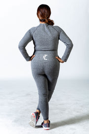 1Enemy's logo is featured on the back of the high waist band of these seamless ribbed gym leggings.  #color_grey