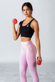 1Enemy's high waisted ribbed gym leggings with a seamless ribbed texture contour the body and make you feel supported throughout your workout. #color_baby-pink