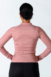 1Enemy's slim fit pink workout jacket is designed to keep you motivated for your workout, even on those chilly days. #color_dusty-pink