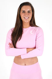 1Enemy's long sleeve ribbed crop top has a soft, seamless ribbed texture that is durable enough for any workout. #color_baby-pink