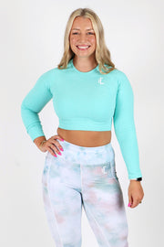This ribbed crop top by 1Enemy offers four-way stretch and a seamless ribbed texture to provide contour and comfort.  #color_light-green