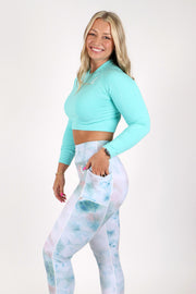 1Enemy's leggings with pockets come in a fun white and blue tie-dye pattern to boost your workout!  #color_vanilla-sky