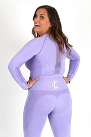 1Enemy's seamless long sleeve crop top has thumbholes for support and mesh detailing for breathability. This workout set will be your new favorite.#color_purple