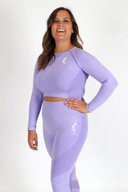 1Enemy's long sleeve crop top is perfect for working out during those winter months. With mesh details for breathability and thumbholes for support, this workout set will be one of your new favorites.  #color_purple