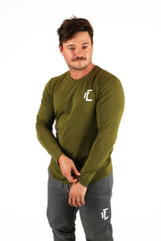 The long sleeve shirts for men come in a variety of colors and the sweat wicking fabric keeps you dry and supported throughout your whole workout.#color_army-green