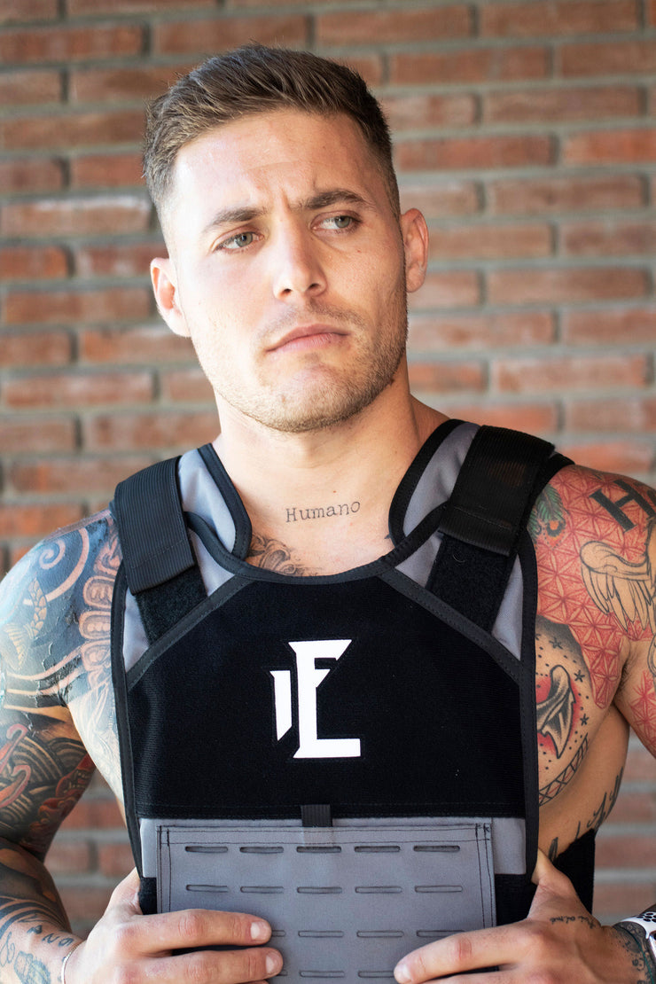 This black and grey weighted training vest is the best way to intensify your workout in style. Designed for comfort and durability, your workout will never be the same! 