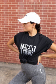 1Enemy's black and white hat with the 1Enemy name on the front is a solid choice for your wardrobe. It's a classic hat with a bold statement.#color_white