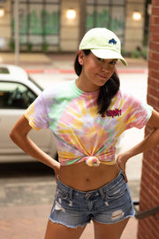 1Enemy's tie-dye workout tee with a swirl of pinks, greens, and yellows to add a vintage vibe to our new streetwear style collection for women. Perfect for training hard at the gym or resting on recovery days. It's the perfect addition to your fitness wardrobe.